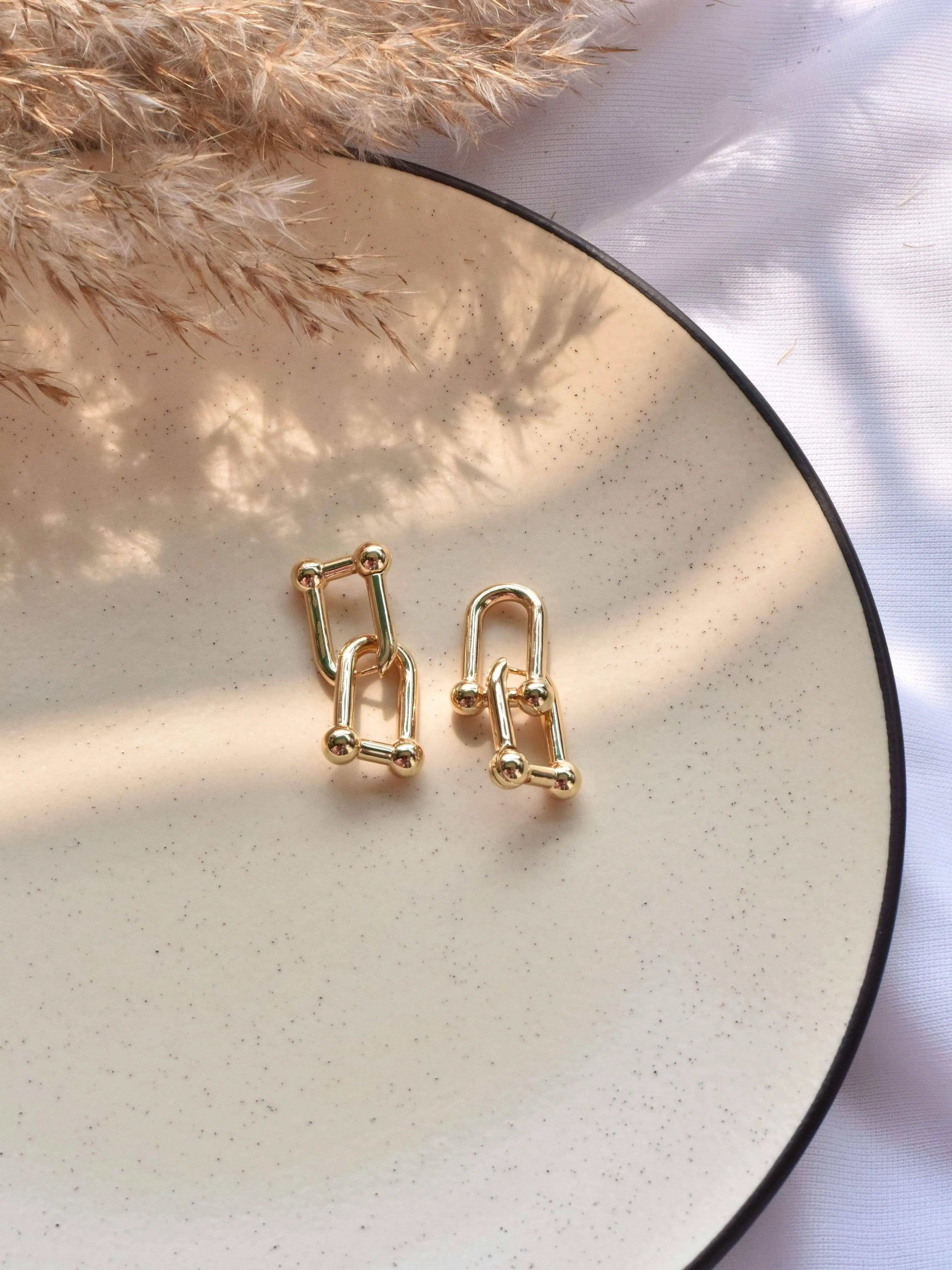 Klissaa Link Flow Statement Earrings