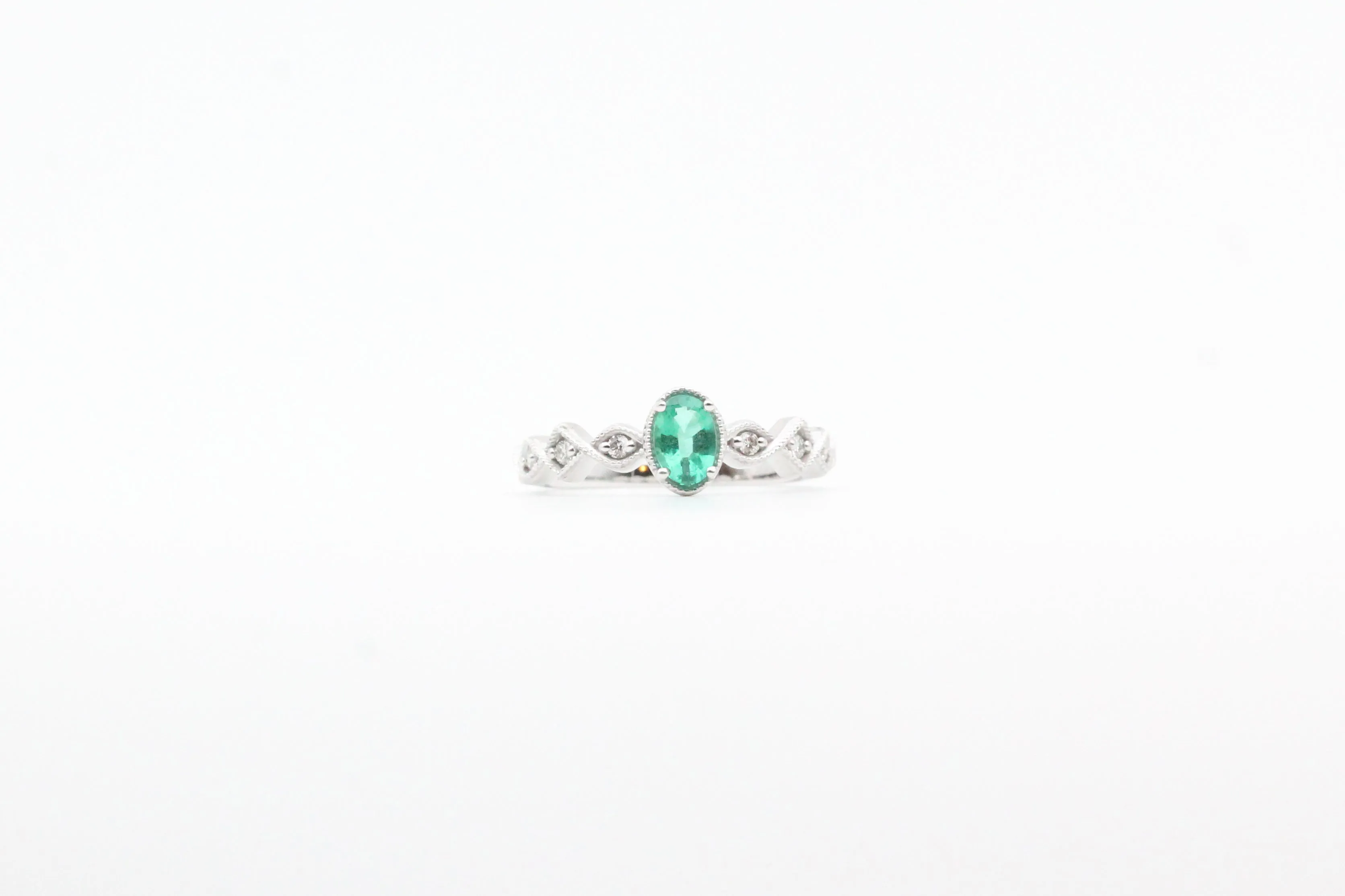 White Gold Oval Emerald and Diamond Ring with Milgrain Band